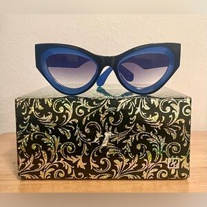 Bold Blue Cat-Eye Sunglasses with Gradient Lenses
